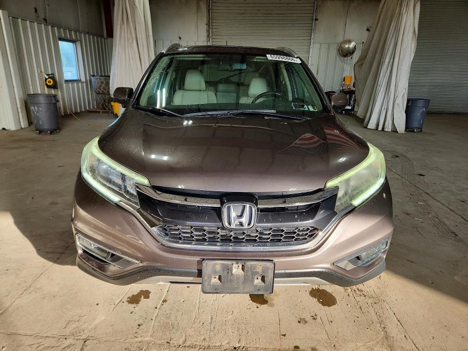 Photo 5 from auction – 2016 HONDA CR-V with VIN 5J6RM4H7XGL030923