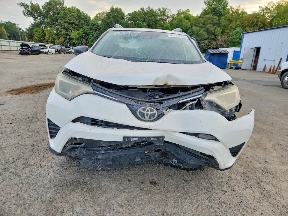 Photo 5 from auction – 2017 TOYOTA RAV4 with VIN JTMZFREV5HD100498