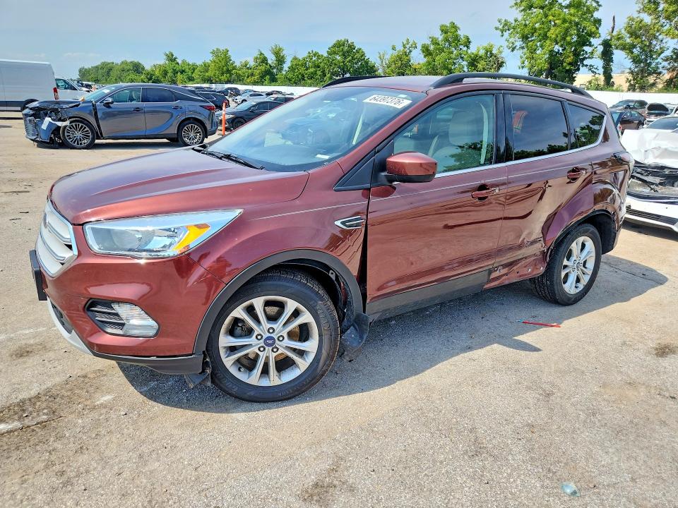 FORD ESCAPE 2018 with VIN 1FMCU0GD4JUA74652 - Photo from auction