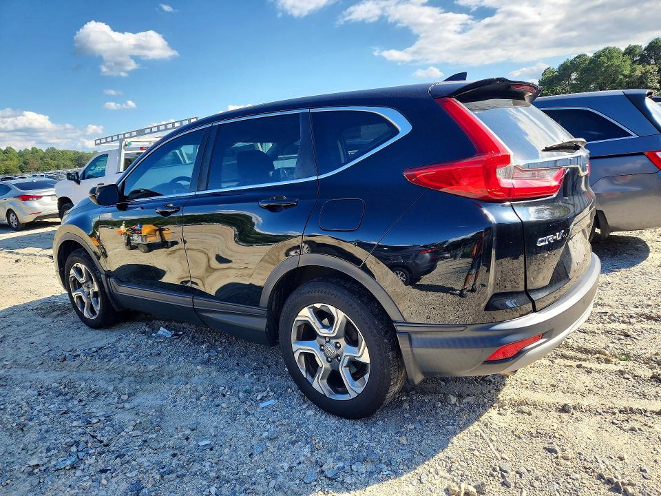 Photo 2 from auction – 2017 HONDA CR-V with VIN 2HKRW2H53HH688429