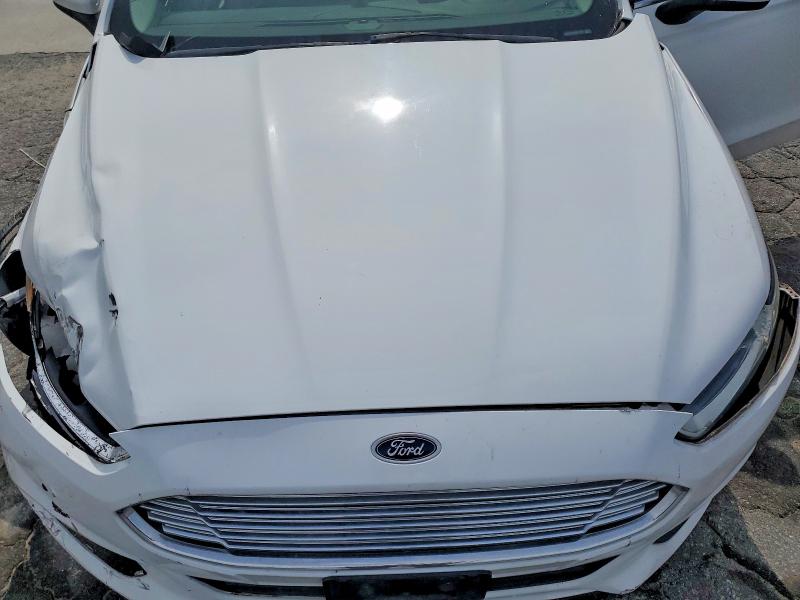 Photo 11 from auction – 2015 FORD FUSION with VIN 3FA6P0G74FR177125