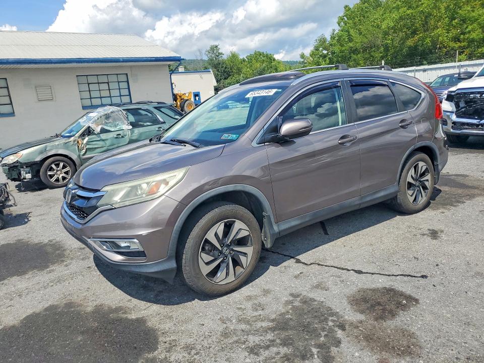 HONDA CR-V 2015 with VIN 5J6RM4H94FL041898 - Photo from auction