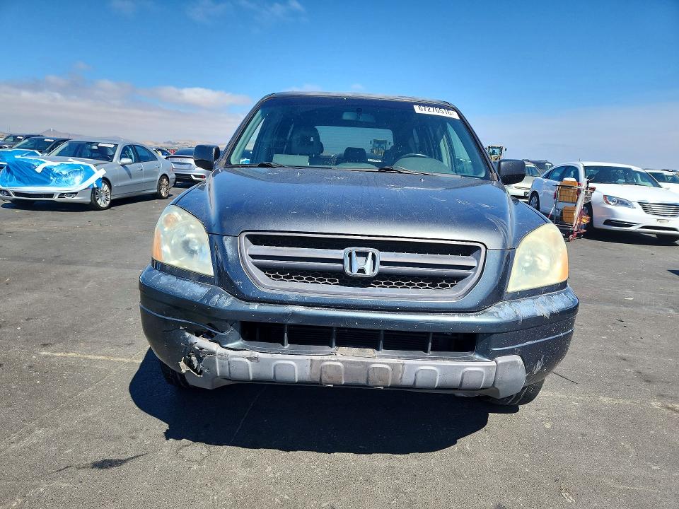 Photo 5 from auction – 2004 HONDA PILOT with VIN 2HKYF18504H616085