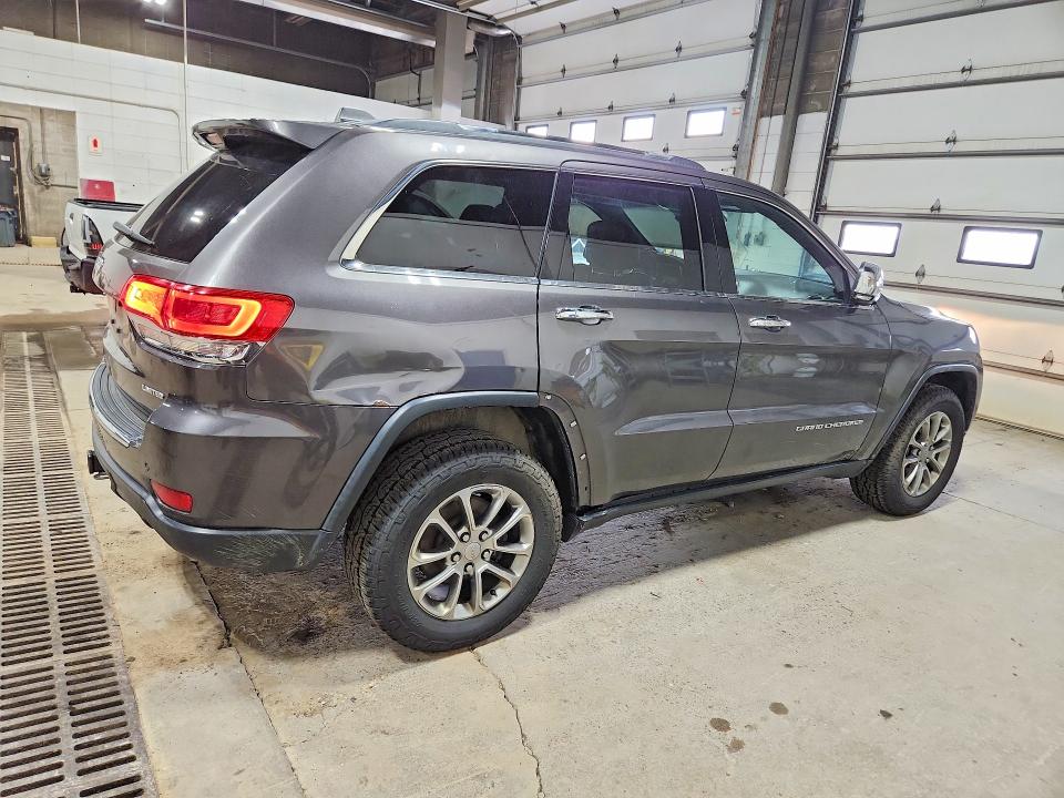 Photo 3 from auction – 2014 JEEP GRAND CHEROKEE with VIN 1C4RJFBG9EC567346