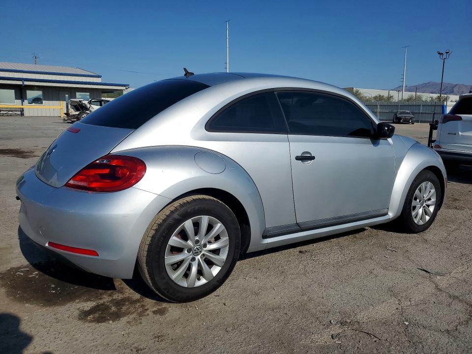 Photo 3 from auction – 2014 VOLKSWAGEN BEETLE with VIN 3VWF17AT6EM642555