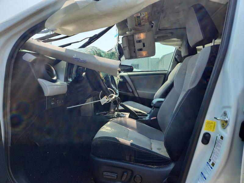Photo 7 from auction – 2018 TOYOTA RAV4 with VIN 2T3RFREV0JW808716