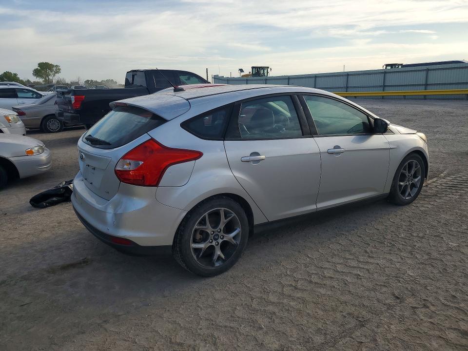 Foto 3 de la subasta – 2014 FORD FOCUS con VIN 1FADP3K28EL210158