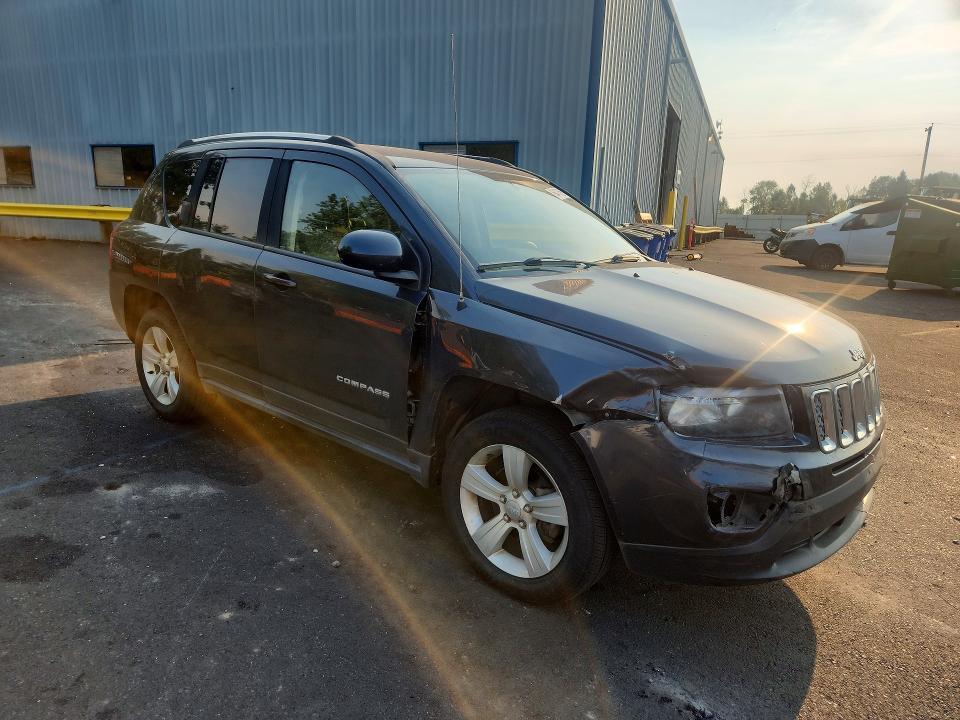 Photo 4 from auction – 2014 JEEP COMPASS with VIN 1C4NJDEB2ED809598