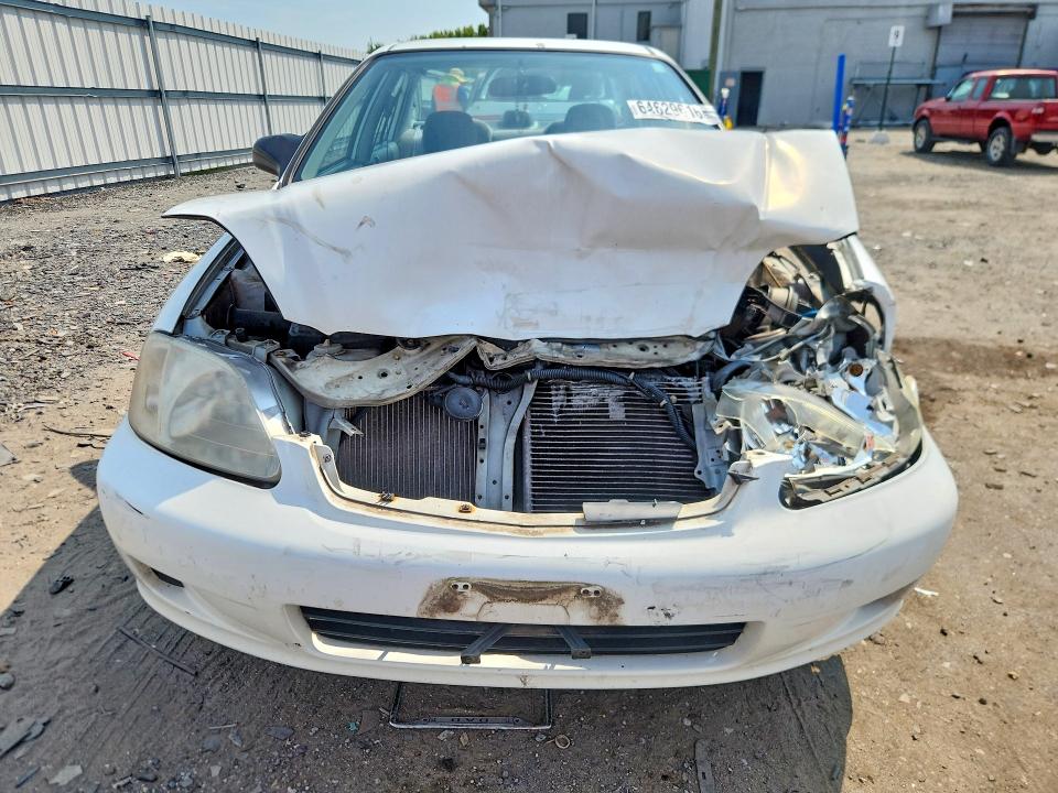 Photo 5 from auction – 1999 HONDA CIVIC with VIN 2HGEJ6673XH566252