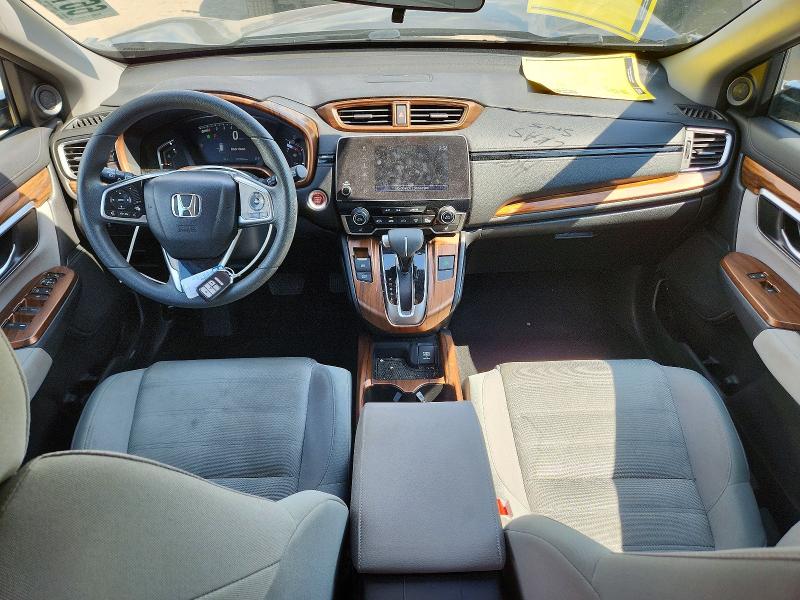 Photo 8 from auction – 2018 HONDA CR-V with VIN 5J6RW1H57JA004564