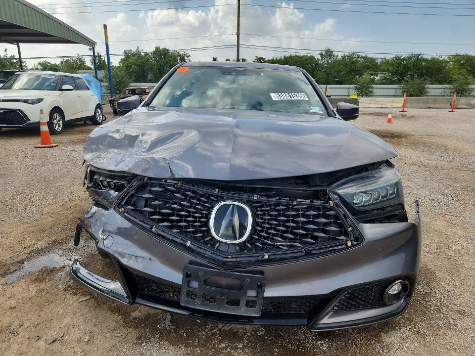 Photo 5 from auction – 2020 ACURA TLX with VIN 19UUB3F69LA002046