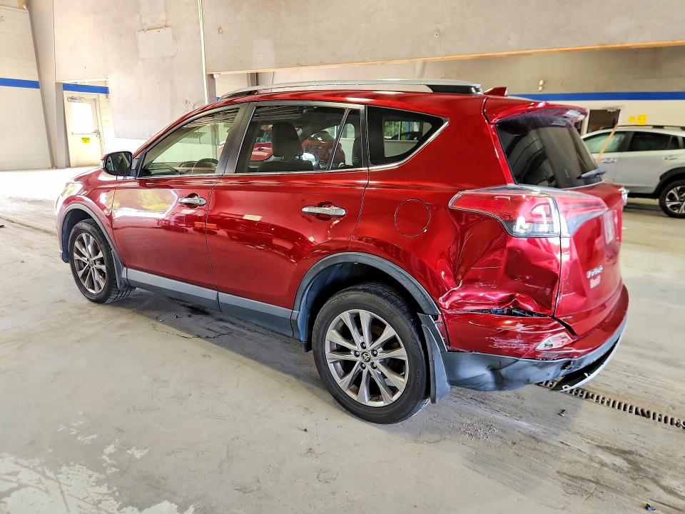 Photo 2 from auction – 2018 TOYOTA RAV4 with VIN JTMDFREV8JD238522