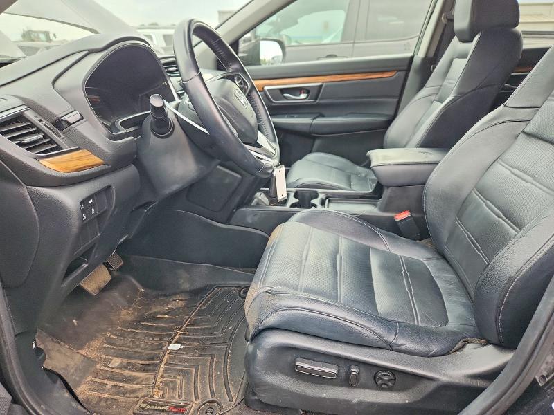 Photo 7 from auction – 2018 HONDA CR-V with VIN 7FARW2H84JE000120