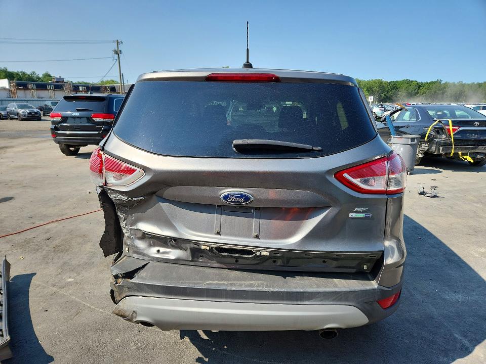 Photo 6 from auction – 2014 FORD ESCAPE with VIN 1FMCU9GX6EUE04621