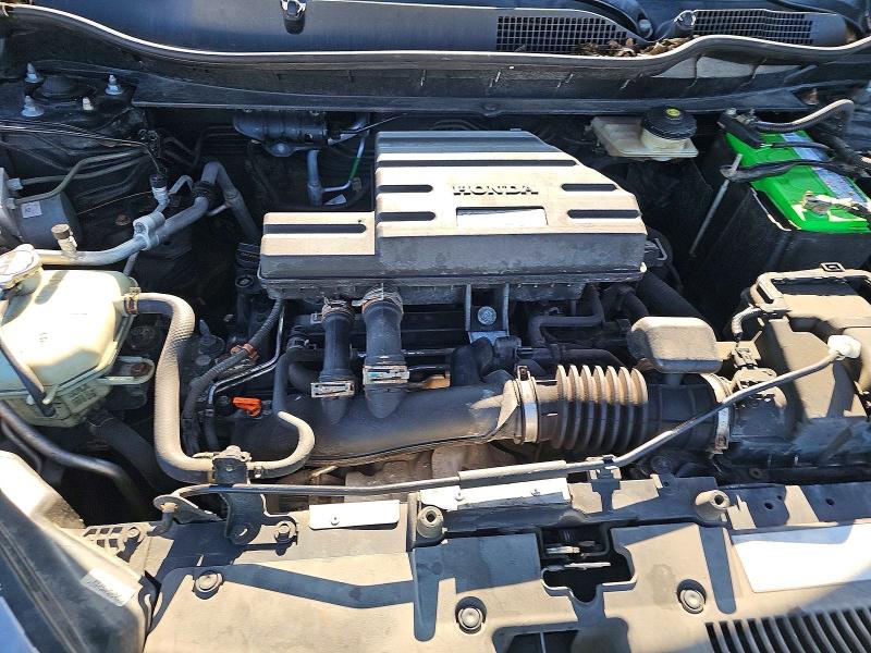 Photo 7 from auction – 2018 HONDA CR-V with VIN 7FARW2H82JE010998