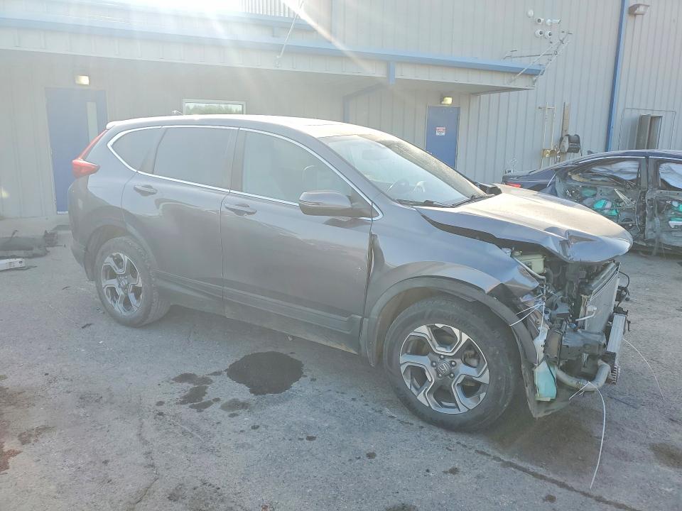 Photo 4 from auction – 2019 HONDA CR-V with VIN 5J6RW2H88KL004143