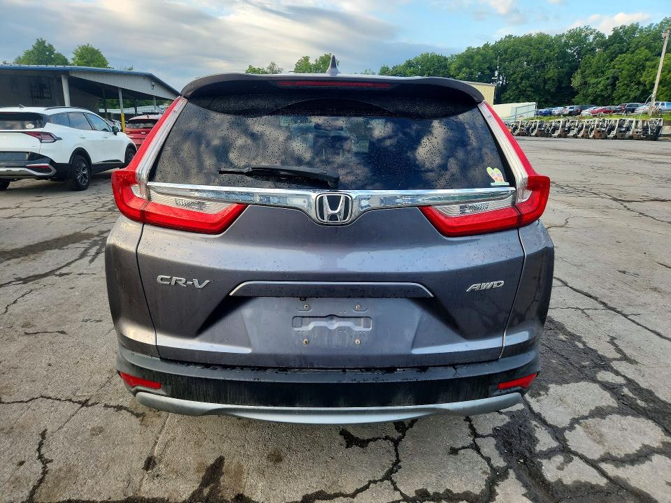 Photo 6 from auction – 2018 HONDA CR-V with VIN 7FARW2H84JE098968