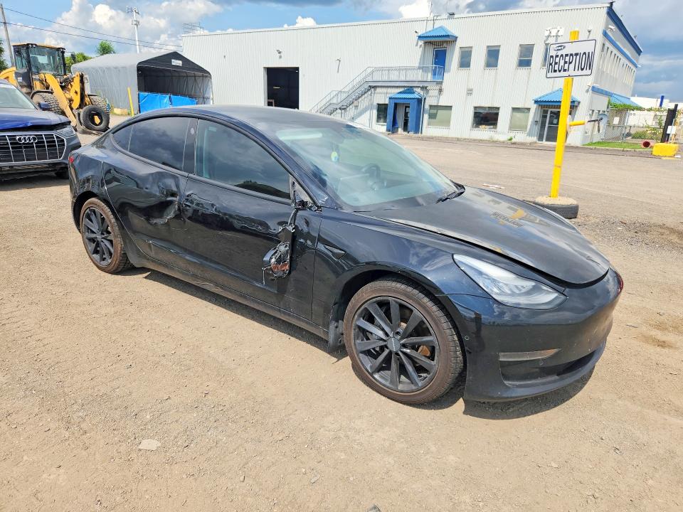 Photo 4 from auction – 2020 TESLA MODEL 3 with VIN 5YJ3E1EA7LF734128