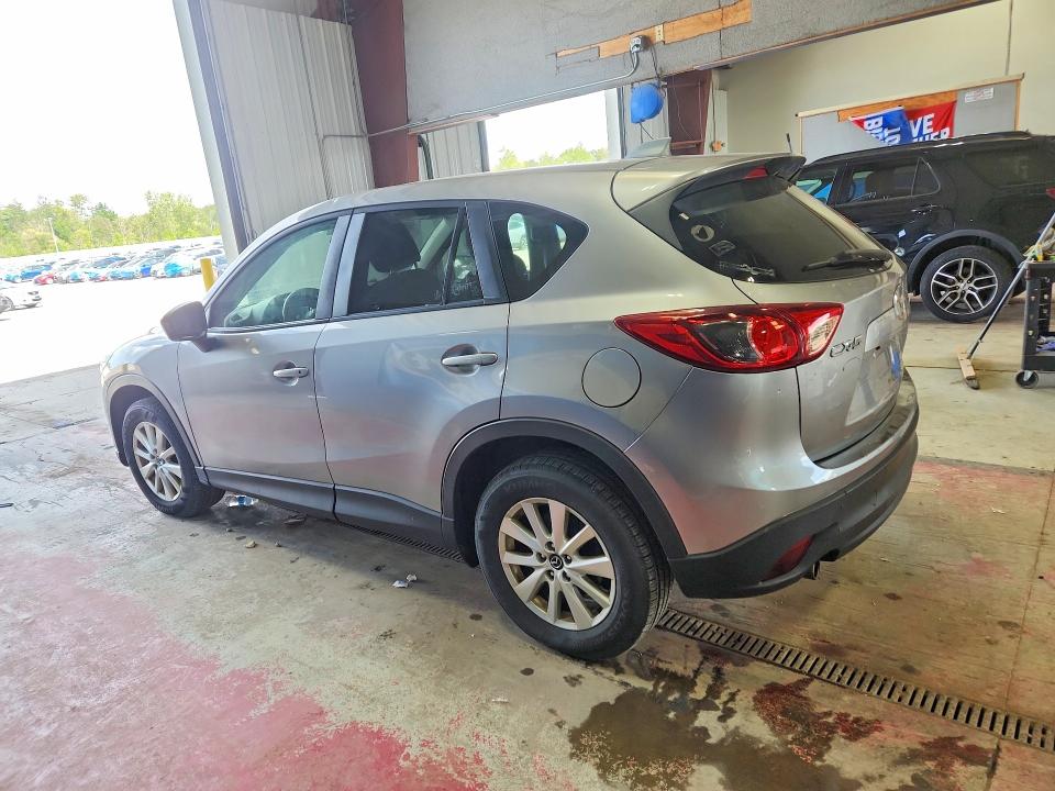 Photo 2 from auction – 2014 MAZDA CX-5 with VIN JM3KE2CY0E0332624