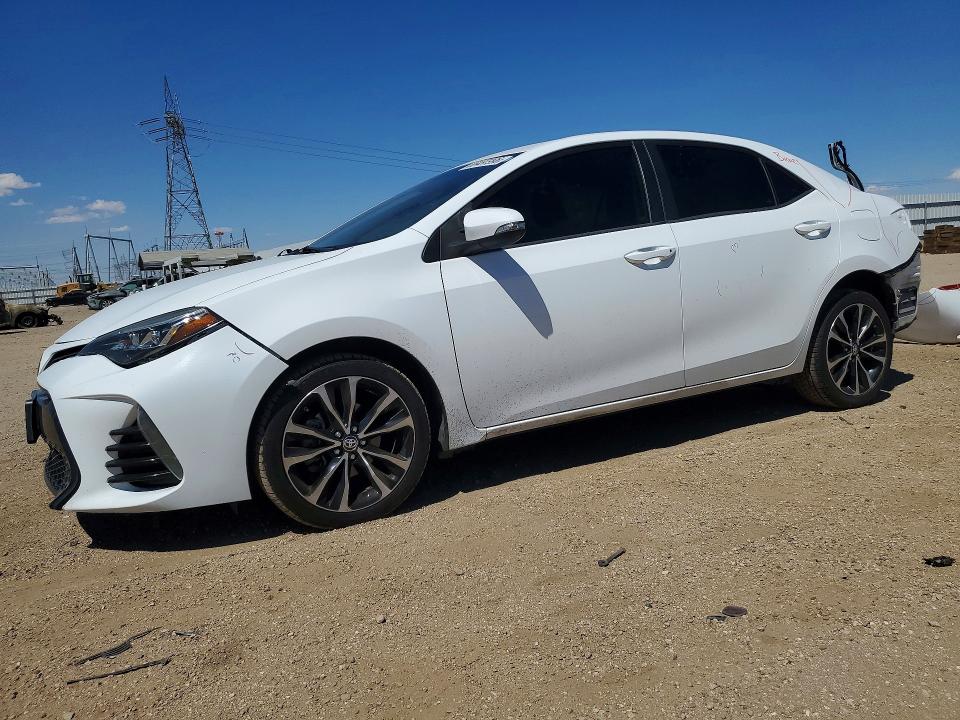 TOYOTA COROLLA 2018 with VIN 5YFBURHE5JP829266 - Photo from auction