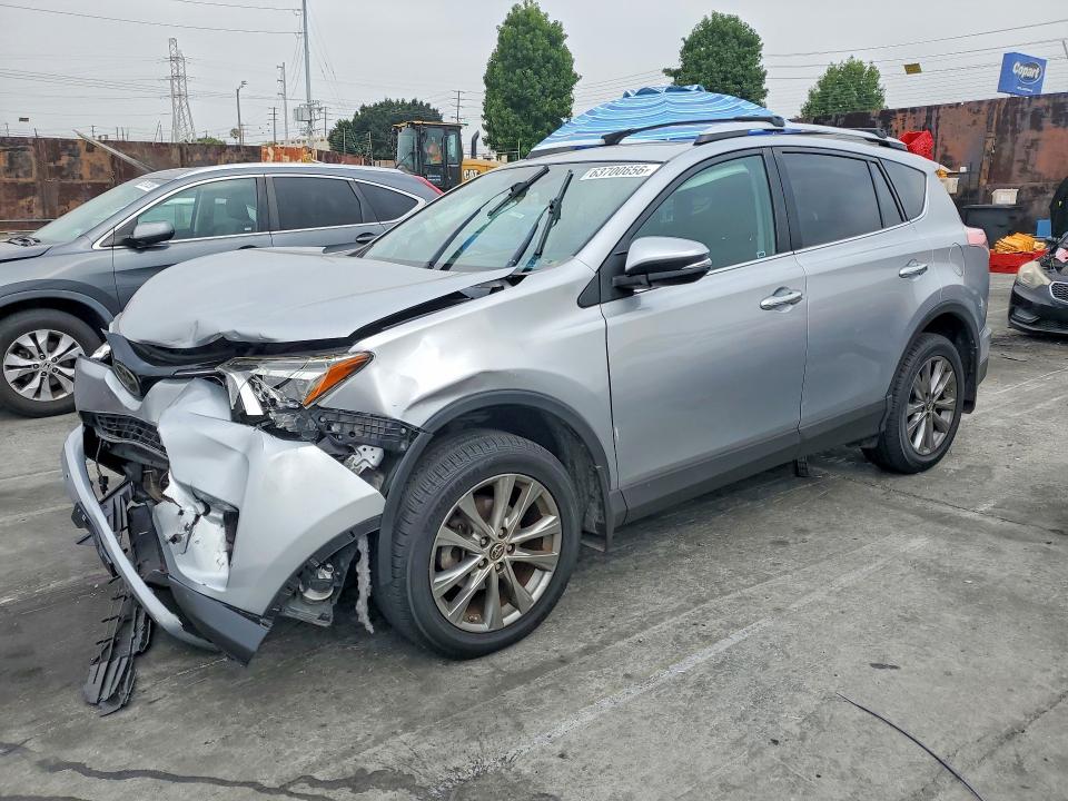 TOYOTA RAV4 2016 z numerem VIN 2T3YFREV2GW311932 - Zdjęcie z aukcji