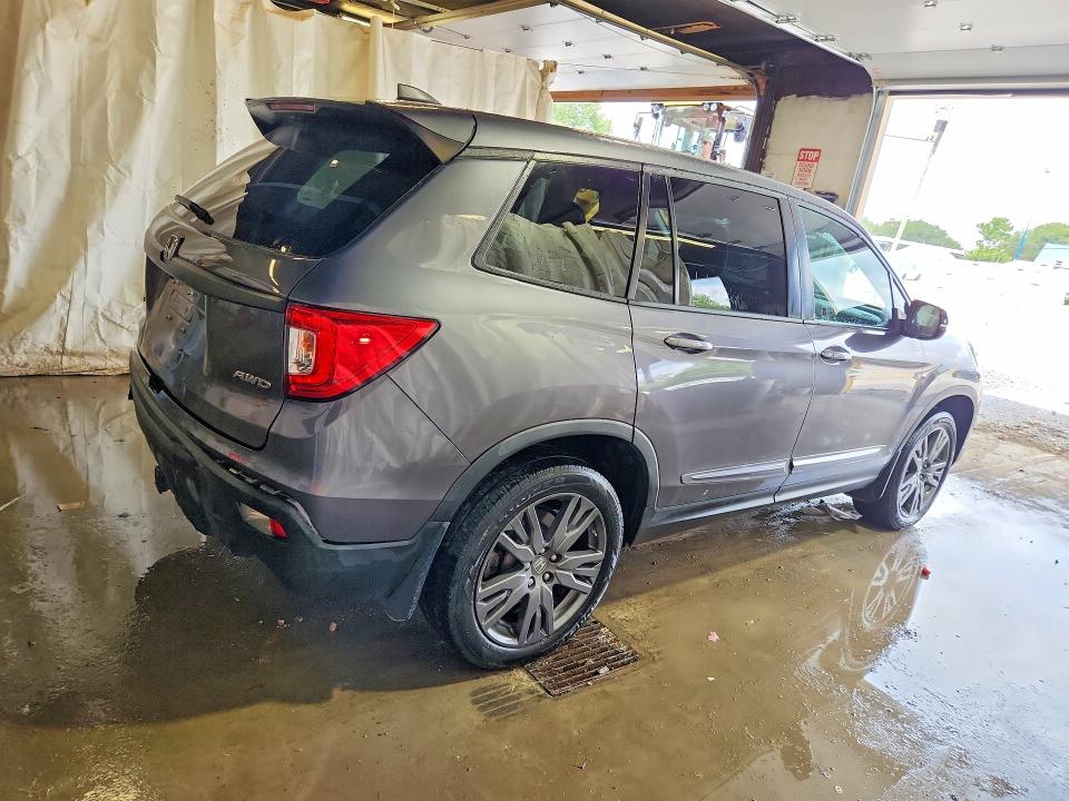 Photo 3 from auction – 2021 HONDA PASSPORT with VIN 5FNYF8H52MB019284
