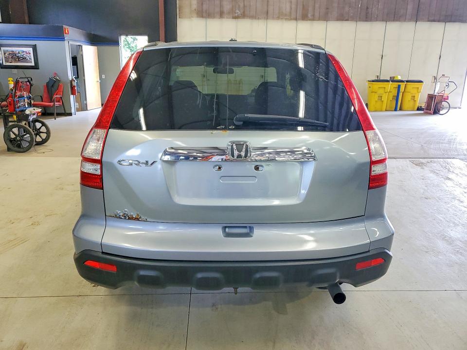 Photo 6 from auction – 2009 HONDA CR-V with VIN JHLRE48599C010136