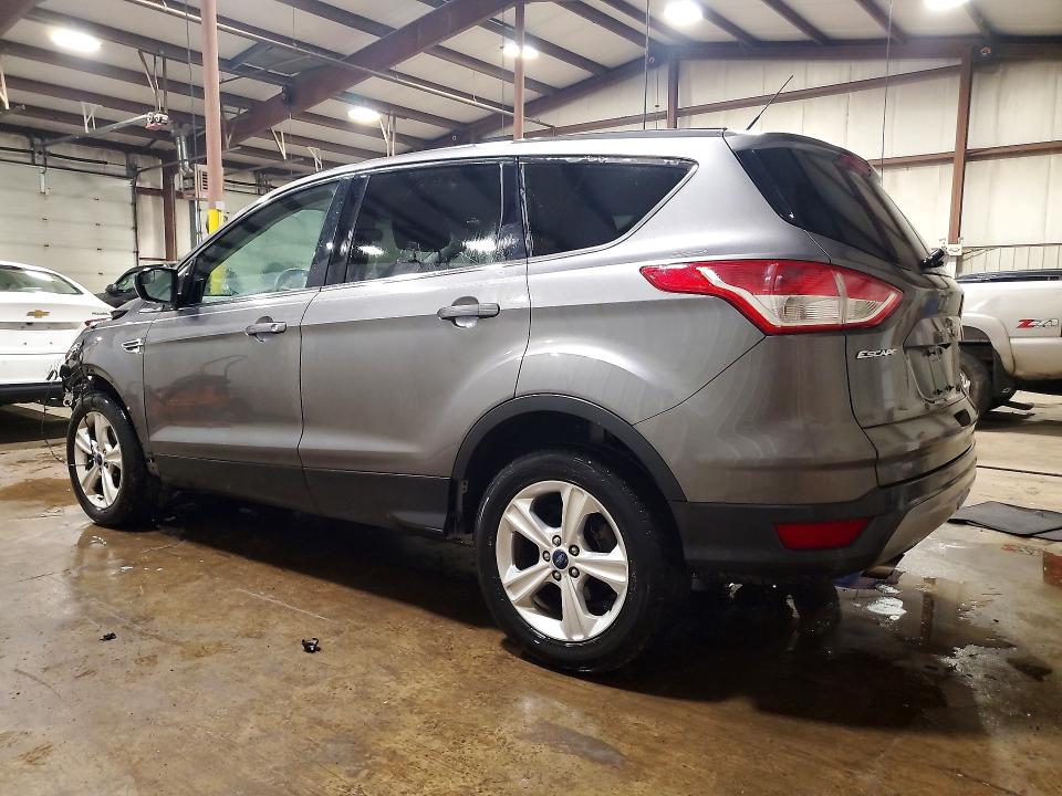 Photo 2 from auction – 2014 FORD ESCAPE with VIN 1FMCU0GX9EUE19657
