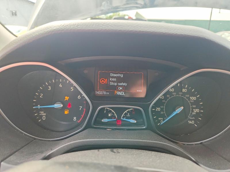 Photo 9 from auction – 2015 FORD FOCUS with VIN 1FADP3F25FL365083