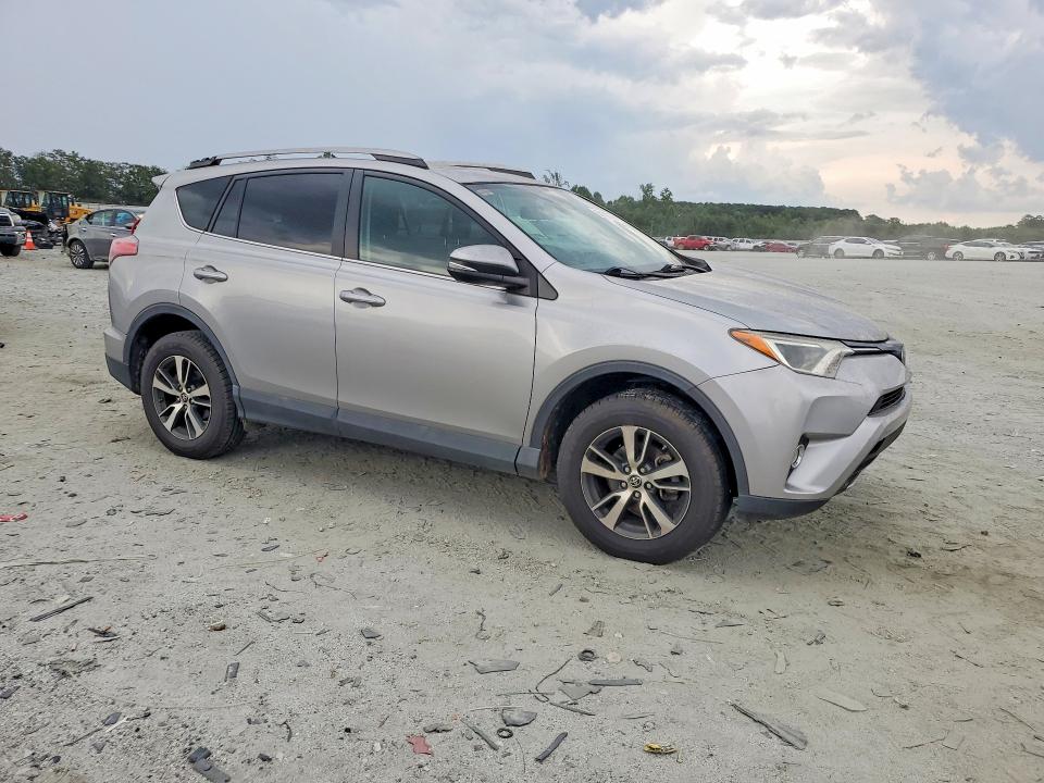 Photo 4 from auction – 2018 TOYOTA RAV4 with VIN 2T3WFREV7JW433216