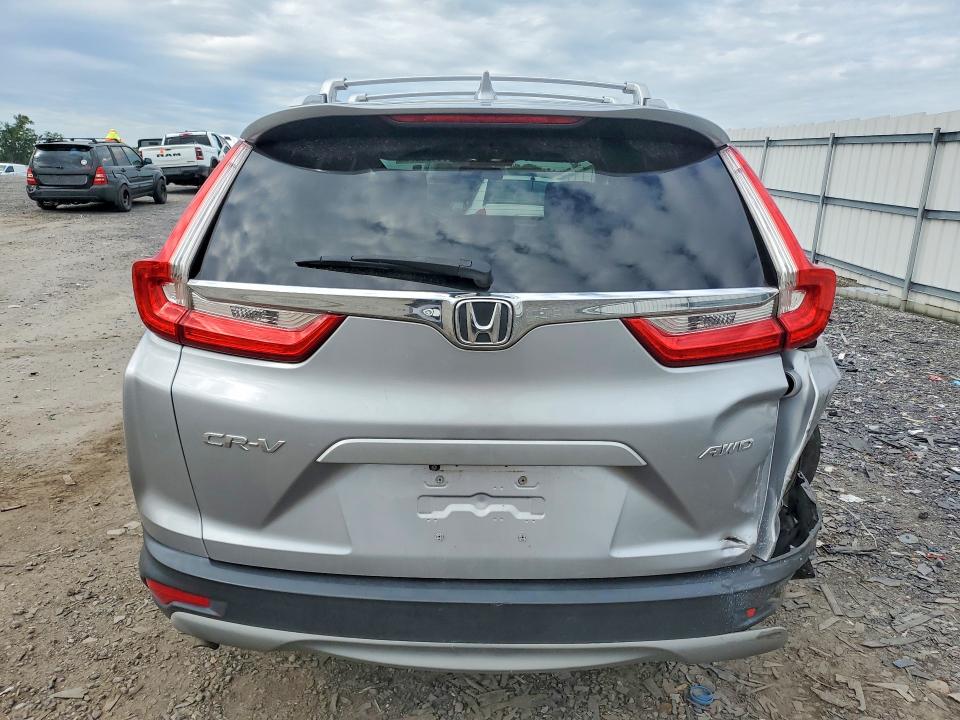 Photo 6 from auction – 2017 HONDA CR-V with VIN 2HKRW2H59HH656777