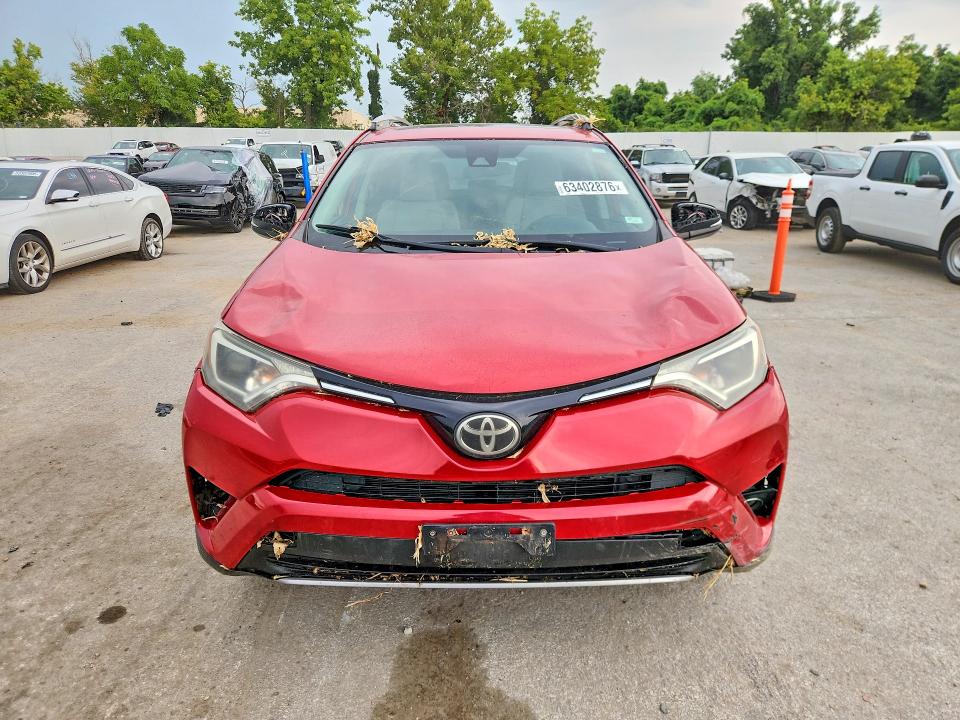 Photo 5 from auction – 2017 TOYOTA RAV4 with VIN 2T3WFREV7HW314642