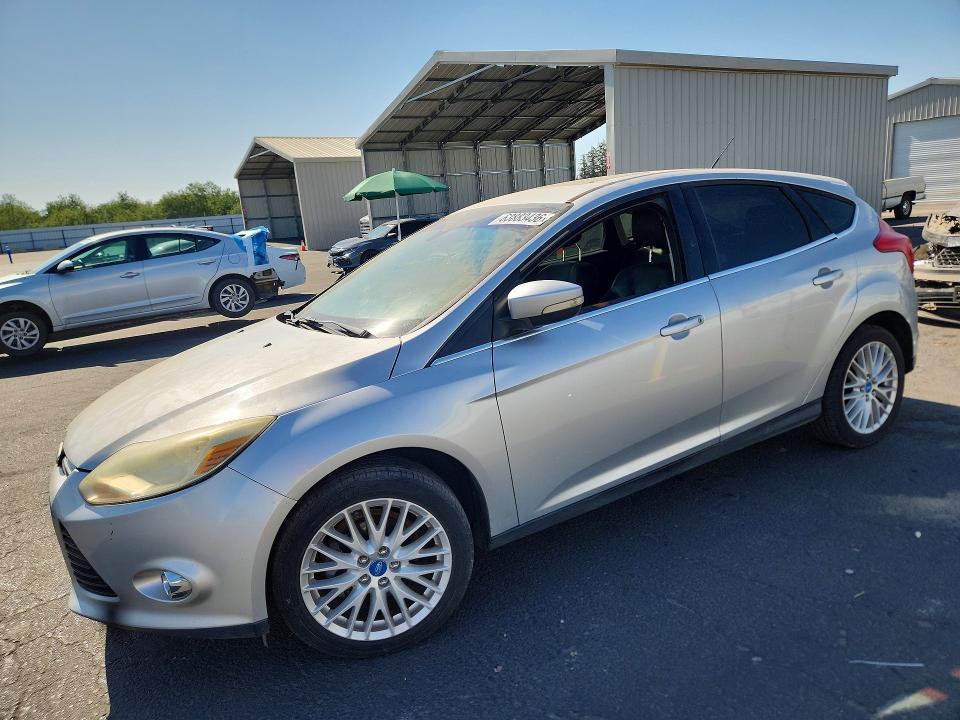 FORD FOCUS 2012 with VIN 1FAHP3M27CL105381 - Photo from auction
