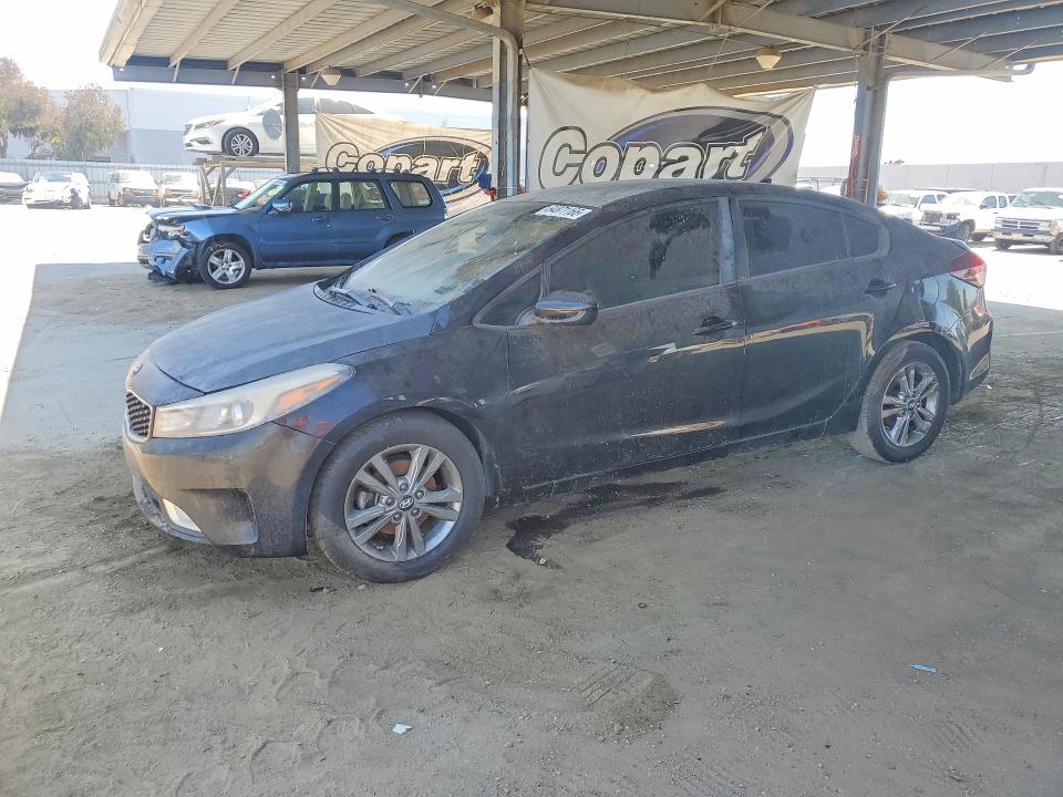 KIA FORTE 2018 with VIN 3KPFK4A75JE224123 - Photo from auction