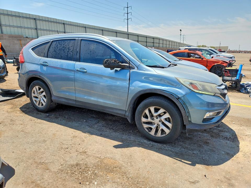 Photo 4 from auction – 2016 HONDA CR-V with VIN 2HKRM3H72GH530076