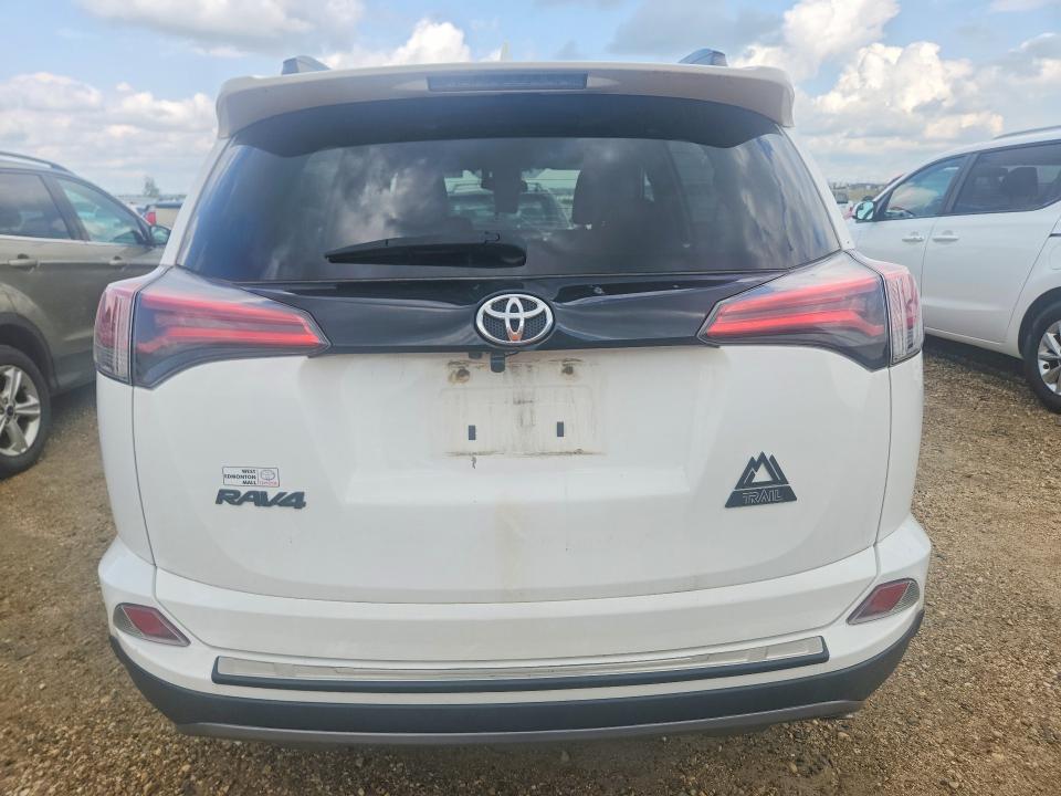 Photo 6 from auction – 2018 TOYOTA RAV4 with VIN 2T3RFREV8JW833458