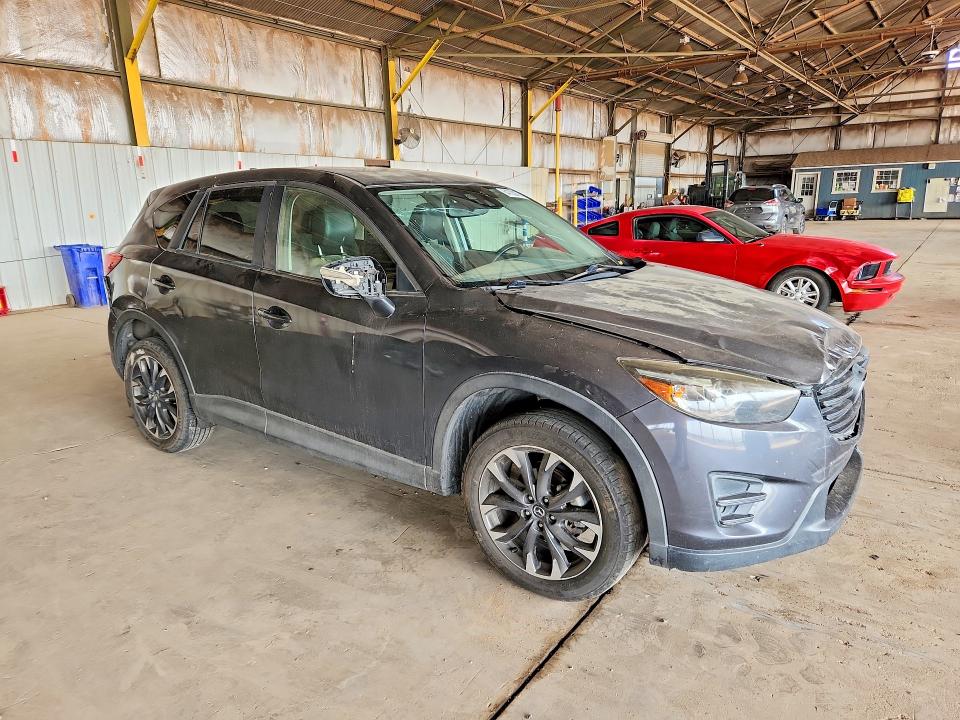 Photo 4 from auction – 2016 MAZDA CX-5 with VIN JM3KE2DY0G0874629