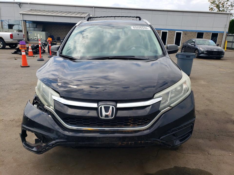 Photo 5 from auction – 2016 HONDA CR-V with VIN 2HKRM4H34GH677597