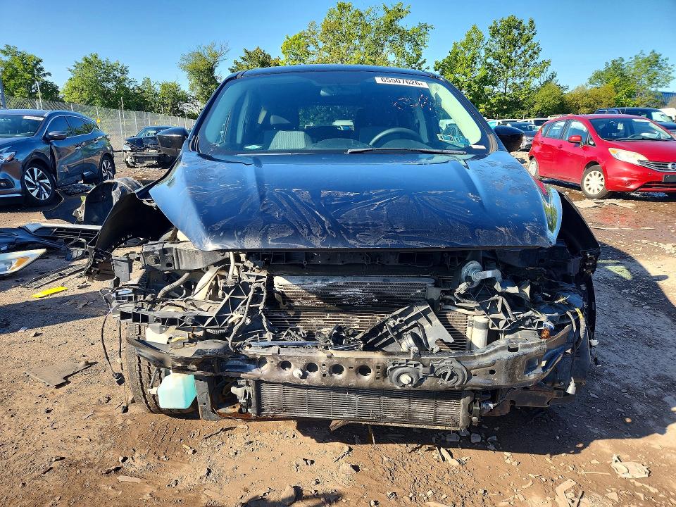 Photo 5 from auction – 2017 FORD ESCAPE with VIN 1FMCU9GD4HUC74655