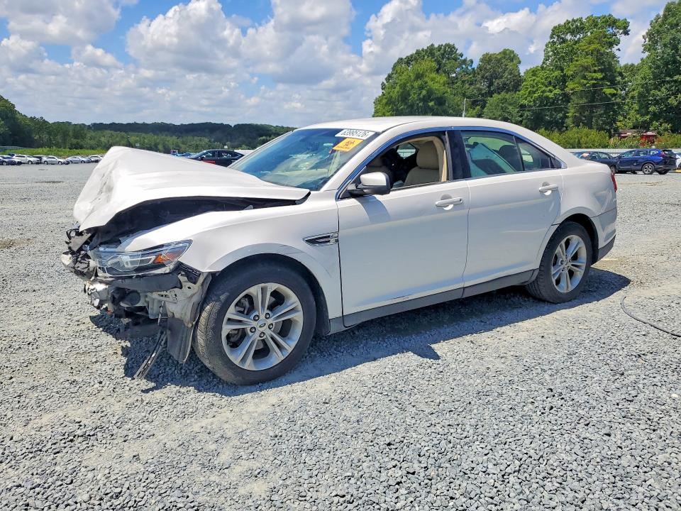FORD TAURUS 2015 with VIN 1FAHP2E87FG137323 - Photo from auction