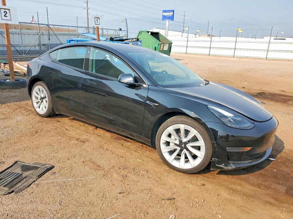 Photo 4 from auction – 2022 TESLA MODEL 3 with VIN 5YJ3E1EB8NF129403