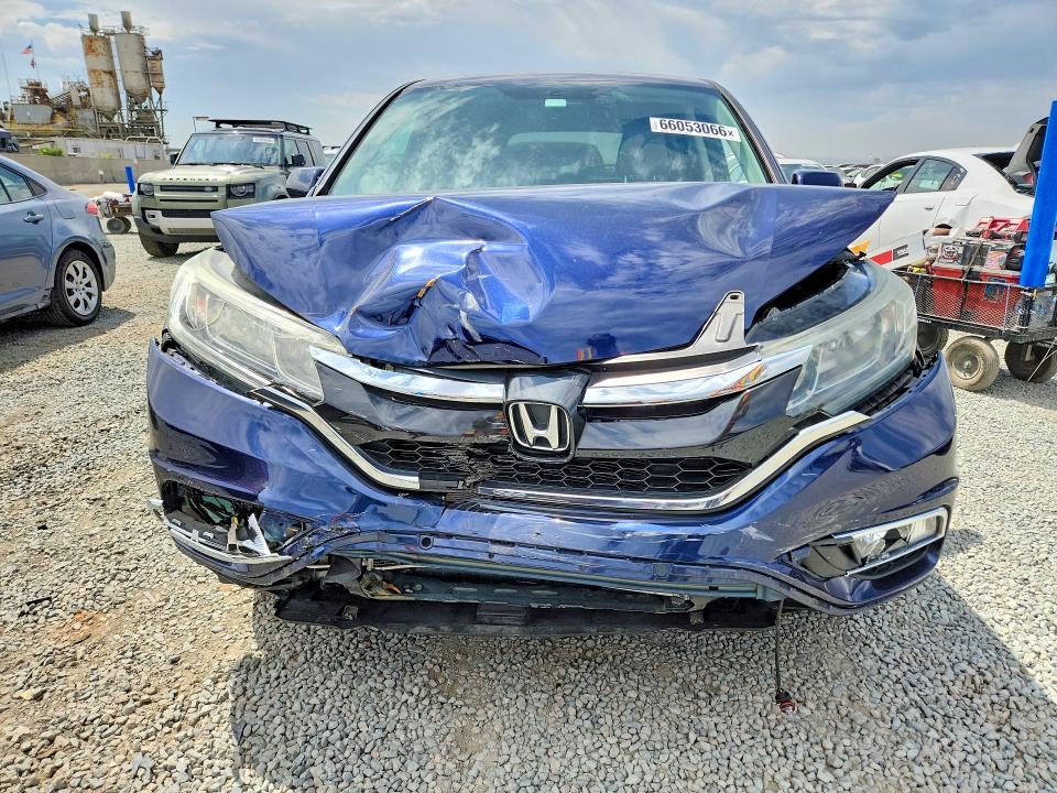 Photo 5 from auction – 2016 HONDA CR-V with VIN 2HKRM3H56GH570000