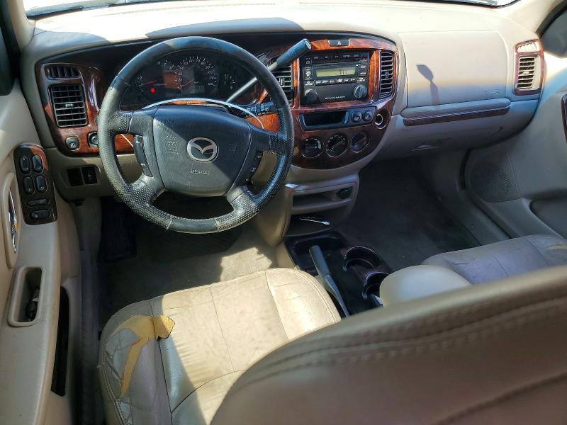 Photo 8 from auction – 2002 MAZDA TRIBUTE with VIN 4F2YU08142KM22591