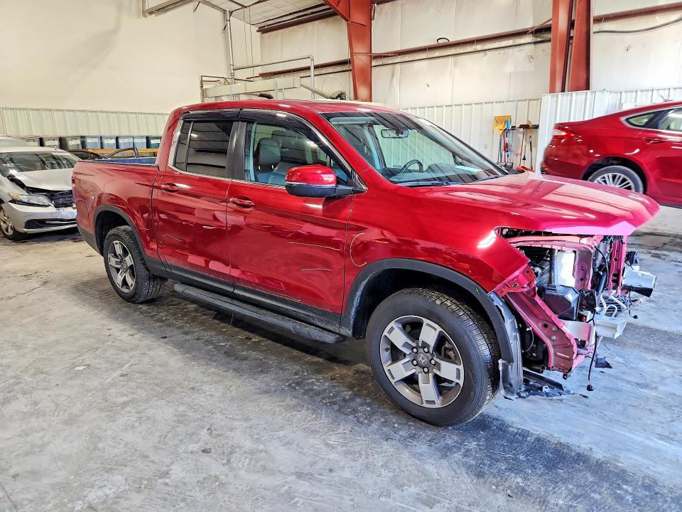 Photo 4 from auction – 2024 HONDA RIDGELINE with VIN 5FPYK3F59RB006855