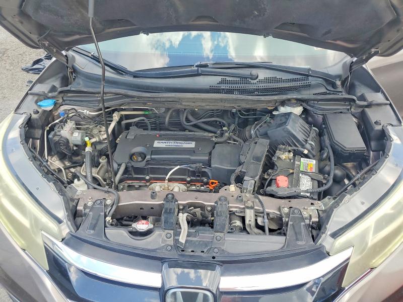 Photo 12 from auction – 2015 HONDA CR-V with VIN 5J6RM4H94FL041898