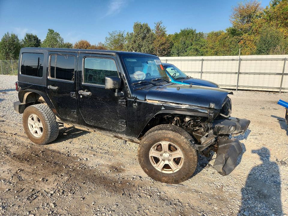 Снимка 4 от търг – 2011 JEEP WRANGLER UNLIMITED с VIN 1J4BA5H10BL638776