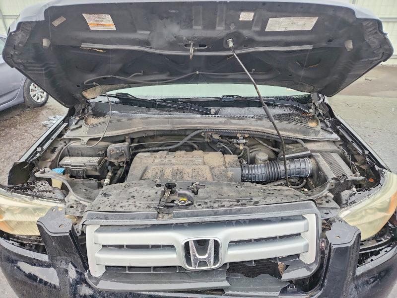 Photo 12 from auction – 2006 HONDA PILOT with VIN 2HKYF18406H563883