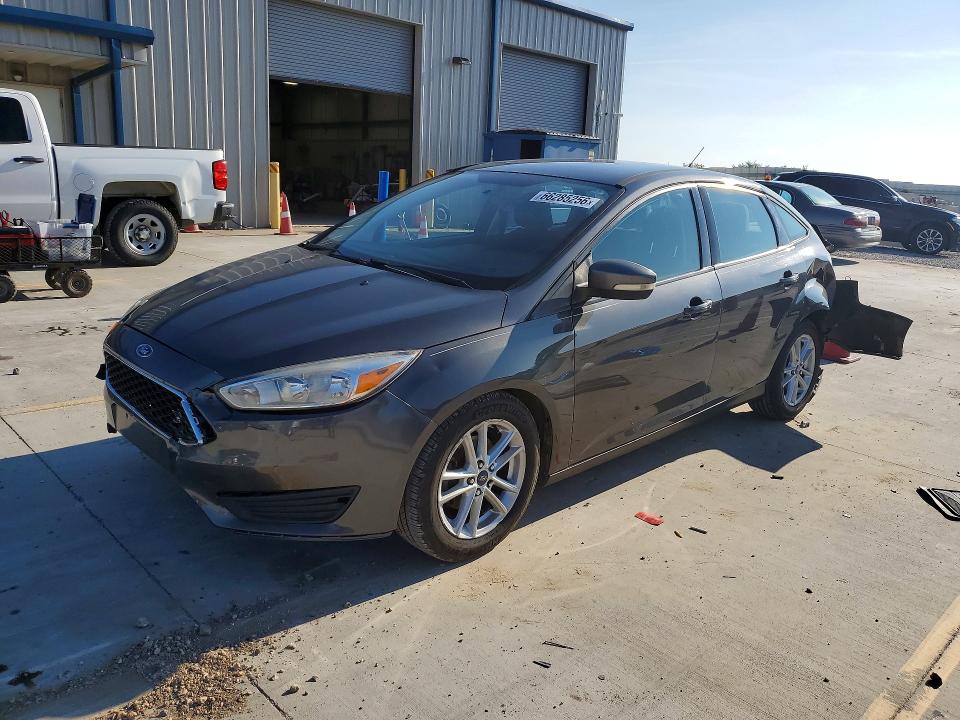 FORD FOCUS 2016 with VIN 1FADP3F27GL280635 - Photo from auction