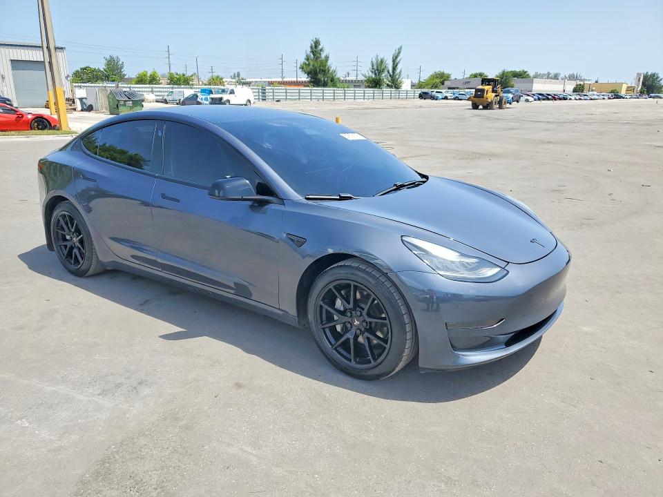 Photo 4 from auction – 2021 TESLA MODEL 3 with VIN 5YJ3E1EA8MF854022