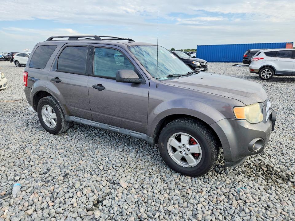 Photo 4 from auction – 2010 FORD ESCAPE with VIN 1FMCU0D71AKB65453